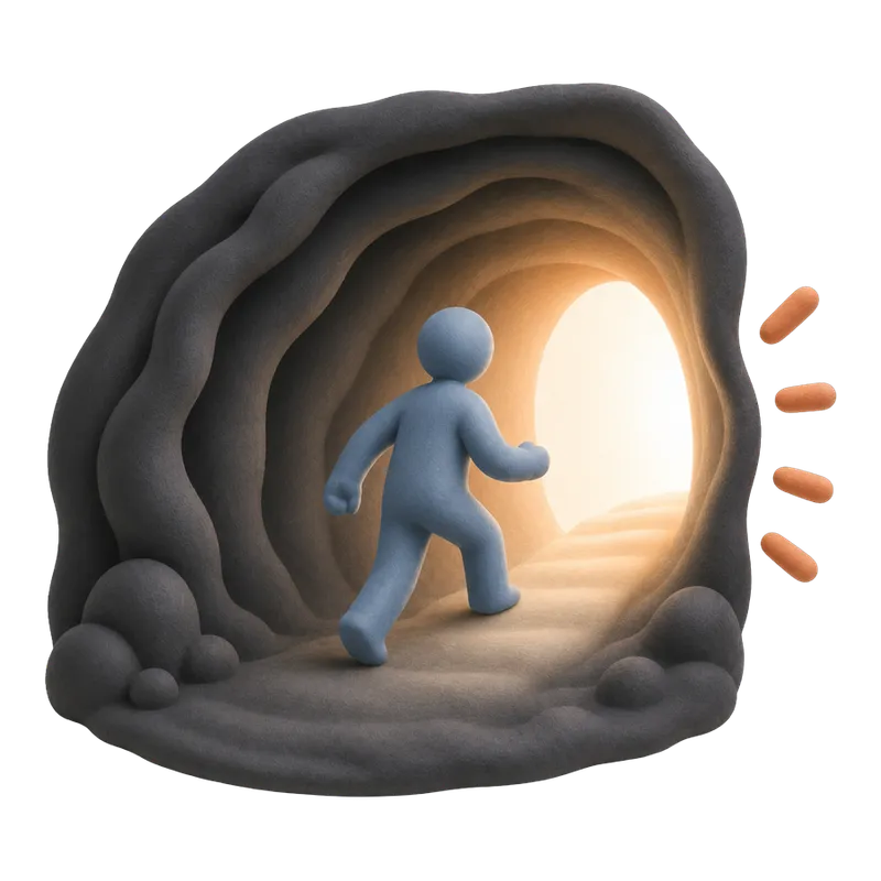 Figura che cammina dentro una grotta buia verso una calda luce dorata che filtra in fondo al tunnel